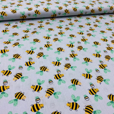 Baumwollstoff, geometrisches Muster, Bienen auf hellgrauem Hintergrund